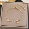 Golden 18k plated stainless steel bracelet with double heart charms and zircon - Gold Double Heart Patchwork Style (5212)