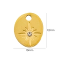 Macro view of 14K gold-plated oval charm with sparkling crystal and starburst pattern - 7095 Star With Zirconia Oval