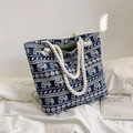 Detail of canvas tote bag with elephant print, thick rope handles and interior lining - Blue Elephant