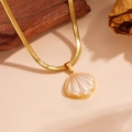 Detailed macro view of the gold-plated shell pendant with a flat snake bone chain - L604 Shell Necklace (Gold)