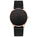 Close-up of black mesh watch strap with rose gold case and red hour markers on dial - Rose Gold Case Black Band Red Indices
