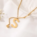 Macro view of gold S letter pendant and square charm on a delicate titanium steel chain - Gold Initial S (8847)