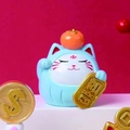 Blue Lucky Cat figurine with orange persimmon and gold ingot on red background - As You Wish Blue Cat