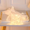 White pleated pearl mesh fabric with warm LED lights on a marble display tray - Luminous Pearl Wave Mesh (28cm*2m) / White