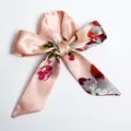 Pink floral satin skinny scarf tied in a bow with artistic flower patterns and glossy finish - S33-Pink Large Floral