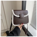 Detail of a brown square crossbody bag with white faux fur trim and sleek metal buckle - Coffee