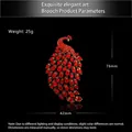 Golden peacock brooch with red rhinestones 76x42mm size and weight specifications - Small Size / Red