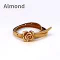 Apricot slim genuine leather belt for women featuring a golden rose flower metal buckle - Apricot / 105cm