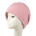 Close-up of pink fine rib knit beanie on a white mannequin head showing soft texture - Pink