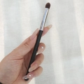 Detail eyeshadow brush with black handle and silver ferrule for precise eye makeup - Round Detail Brush