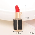 Macro shot of lipstick pendant charm with red enamel and sparkling crystal accents - D164 Lipstick (Red)