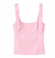 Detail of pink sleeveless top featuring chic shoulder bows and smooth knit fabric - XS / Pink