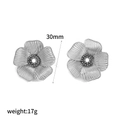 Detail of 30mm silver flower earrings with 17g weight and center pearl inlay - Silver Textured Style (TE60428-S)