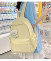 Detail of yellow nylon backpack with cloud plush charm and side fashion label - With Pendant / Yellow