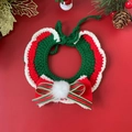 Christmas pet knit collar with red bow and white pompom on a festive red background - Pompom Bowknot Scarf