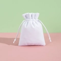 Soft white velvet drawstring pouch for jewelry packaging on light pastel background - 7*9cm / White