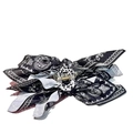 Franse haarklem met zwart-wit paisley patroon en een stevige gouden metalen veer - Zwart