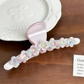 Pink acetate flower hair claw clip with rhinestones displayed on a wooden surface - 12.2CM / Pink