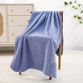 Blue-purple coral fleece towel with vertical striped texture on a wooden chair - Bath Towel (70x140cm) / Blue