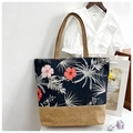 Minimalist canvas tote with floral patterns and beige linen stitching on a wooden desk - Red Pink Small Flower