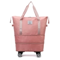 Pink waterproof nylon travel bag with universal wheels and expandable storage layer - Pink