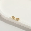 Detailed view of gold butterfly earrings with sparkling crystals and white mother-of-pearl - White Zircon Butterfly (ES2604)