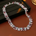 Detail of vintage silver necklace with pink gems and turquoise zircon accents on velvet - Necklace - Silver-Pink-Blue-Magenta