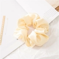 Premium cream satin scrunchie with silk gloss finish and elegant folded texture - Off-white