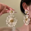 Macro detail of large daisy tassel earrings with 3D white petals and golden stamen studs - Exaggerated Embroidered Large Flower Style / 10# 925 Sterling Silver Earring Post - Gold - Deep Pink