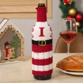 Christmas knitted wine bottle cover with red and white letters and gold buckle design - Letter I