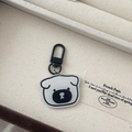 Minimalist white acrylic bear keychain with black outlines and metal clasp for bags - Pug