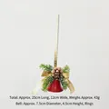 Christmas decoration featuring a red bell with a gold bow, pine cone, and green needles - Gold Snowflake Ribbon Bell