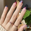 Rose gold flower and butterfly rings shown with colorful French tip floral manicured nails - French Floral Style - With Glue (U-214)