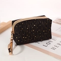 Portable black cosmetic bag with gold star pattern and zipper for travel storage - Black
