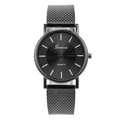 Orologio al quarzo minimalista con quadrante nero e cinturino in maglia grigio scuro - Nero