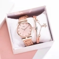 Close-up of Tadi rose gold watch set with crystal-studded star pendant bracelet in gift box - Watch + Bracelet + Gift Box Set / Pink
