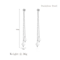 Long stainless steel tassel earrings with round white pearls and double chain drop detail - Silver (LE3067)