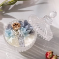 Scented soy candle in glass jar with dried blue and purple flowers and Long Fine label - Bluebell