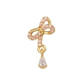 Detalle de pendiente de lazo dorado con cristales rosas y colgante de gota - Dorado-Lazo Lágrima