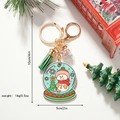 Llavero de Navidad con muñeco de nieve, borla verde y amuleto de bola de nieve lindo - Muñeco de Nieve