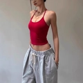 Slim fit red halter neck crop top for women in a vibrant ribbed knit style - Red