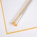 Transparent flower wrapping paper with vibrant orange-yellow edge decoration detail - Favorite OPP - Ginger Yellow