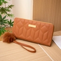 Brown quilted PU leather long wallet with pompom charm and golden zipper closure - Brown