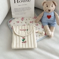Quilted beige sanitary pouch with cute tulip embroidery and button closure - Tulip
