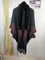 Detail of knit shawl featuring faux fur collar and fringe hem in black and red contrast - Black/White