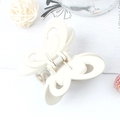 Elegant cream white butterfly hair claw clip with cutout wings for a chic updo style - White
