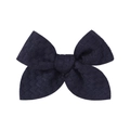 Detail of navy blue knitted bow hair clip with textured square grid pattern fabric - Dark Blue
