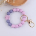 Detail of purple silicone bead bracelet keychain with rose charm and gold hardware - Light Purple Rose