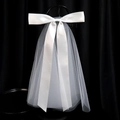 Short bridal veil with elegant white satin bow and cascading ribbons on black backdrop - Pure White