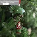 Christmas iron hot air balloon ornament featuring Santa Claus hanging on a tree - Green Santa